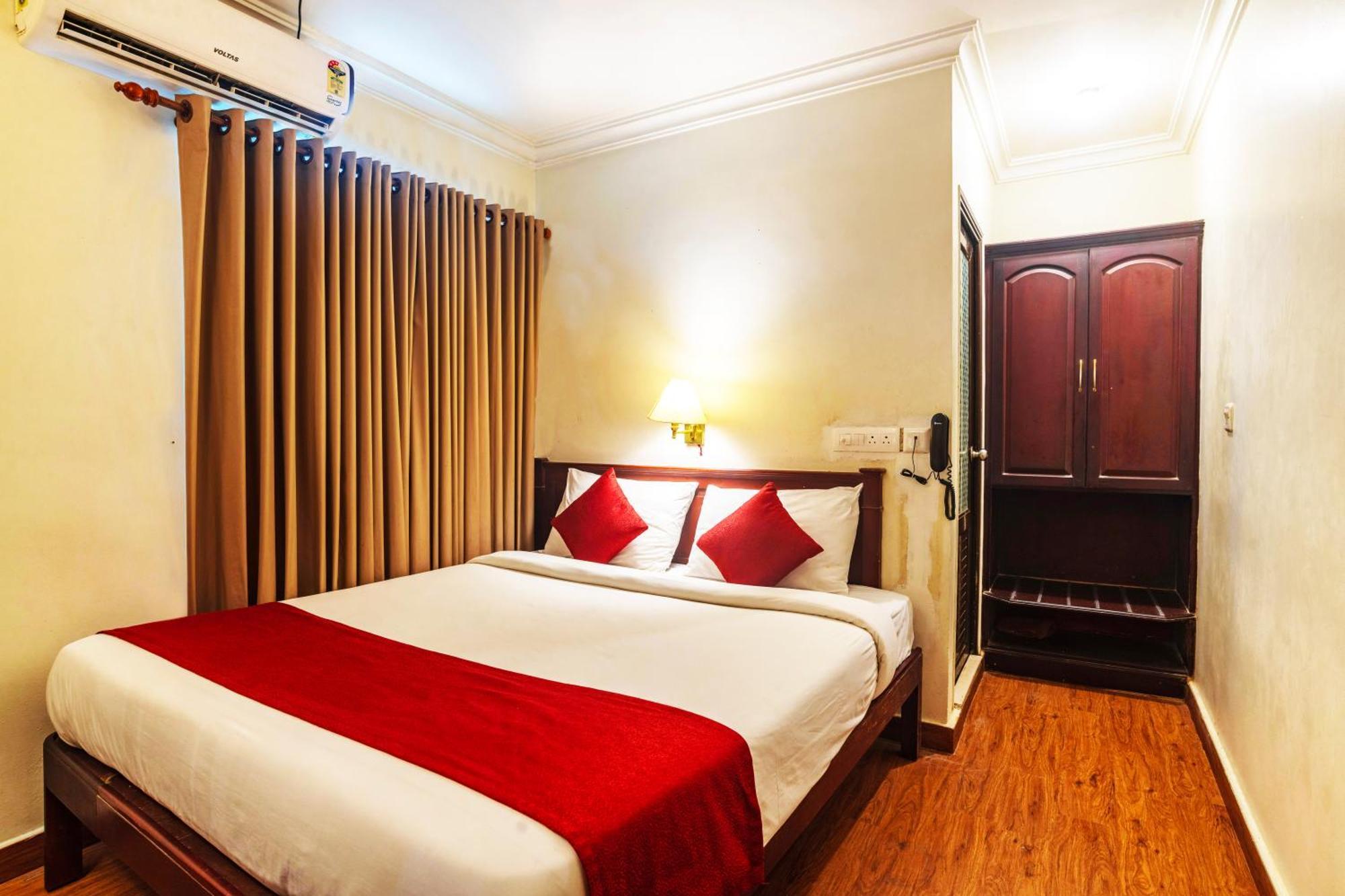 Hotel Archana Inn Kochi Szoba fotó