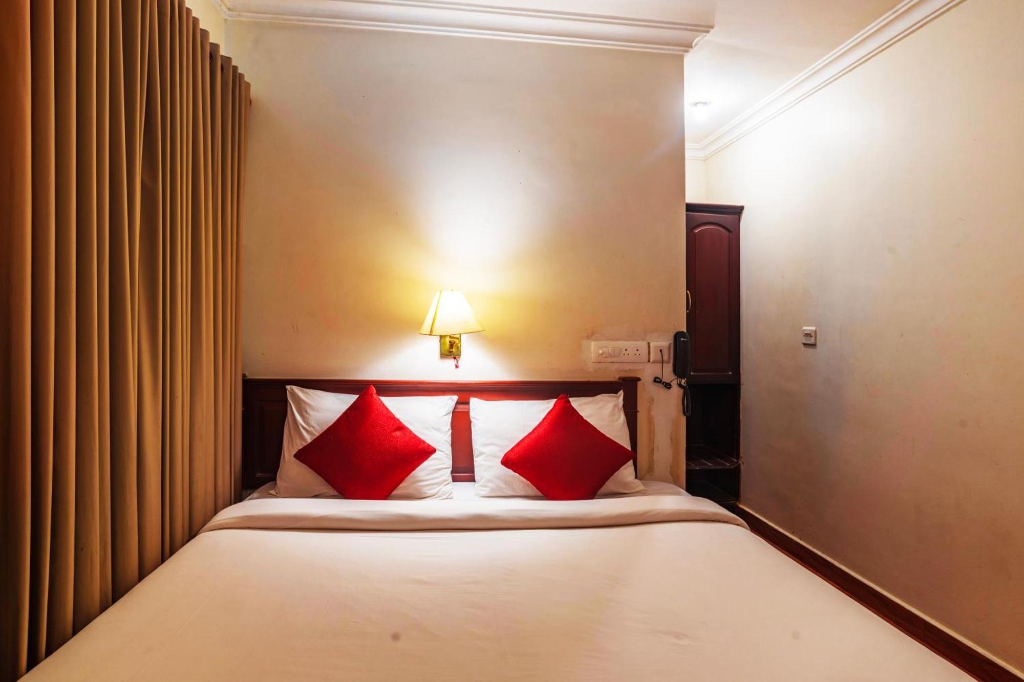 Hotel Archana Inn Kochi Szoba fotó