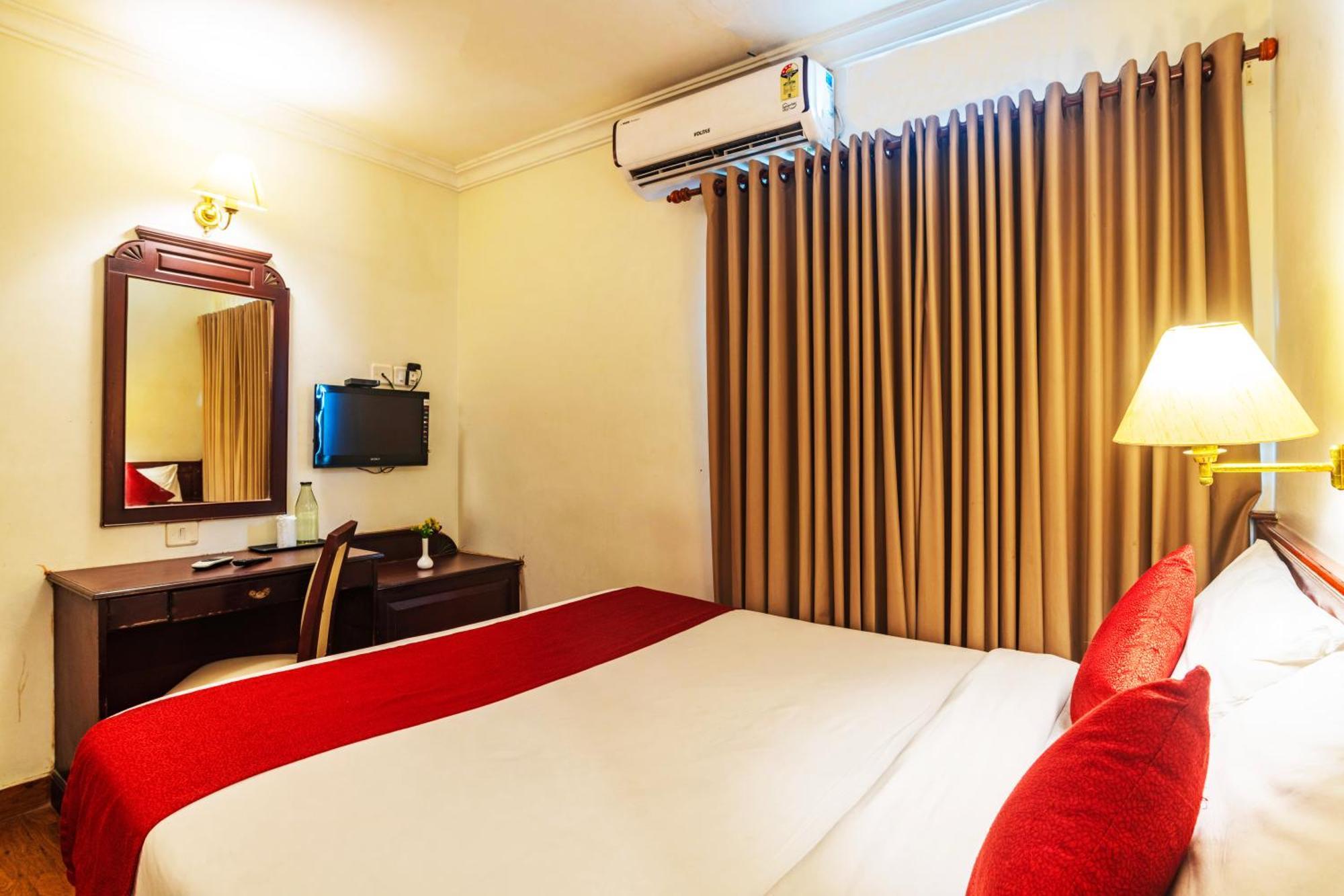 Hotel Archana Inn Kochi Szoba fotó