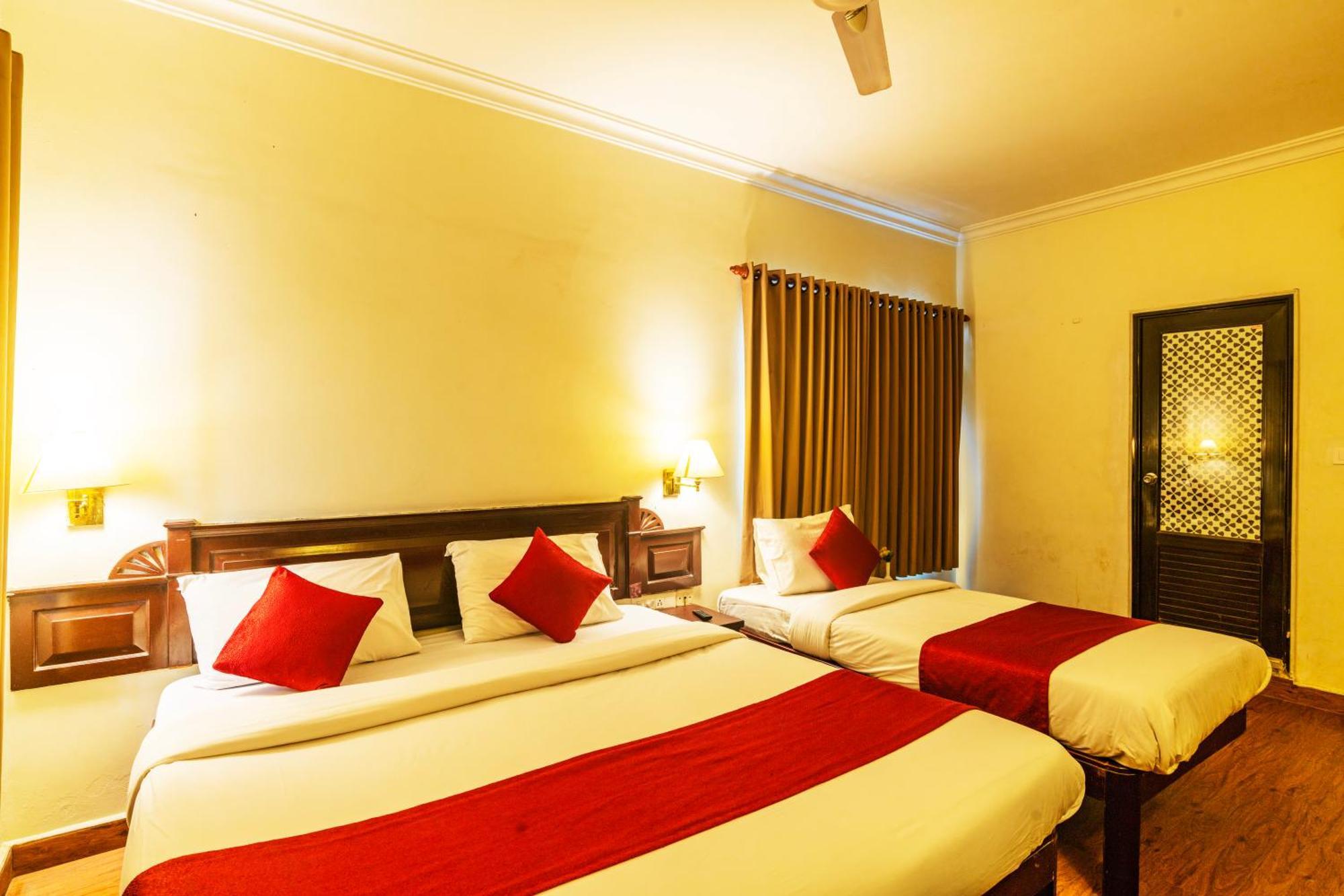 Hotel Archana Inn Kochi Szoba fotó