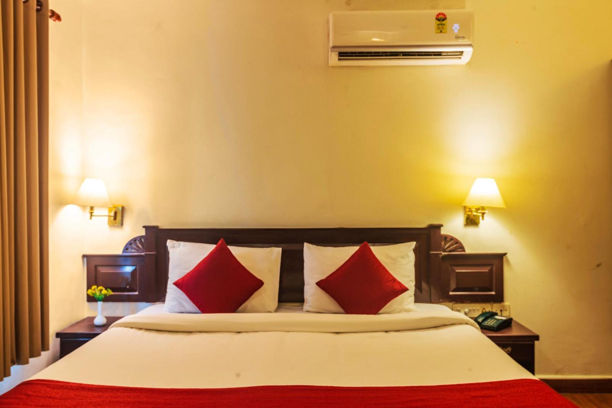 Hotel Archana Inn Kochi Szoba fotó