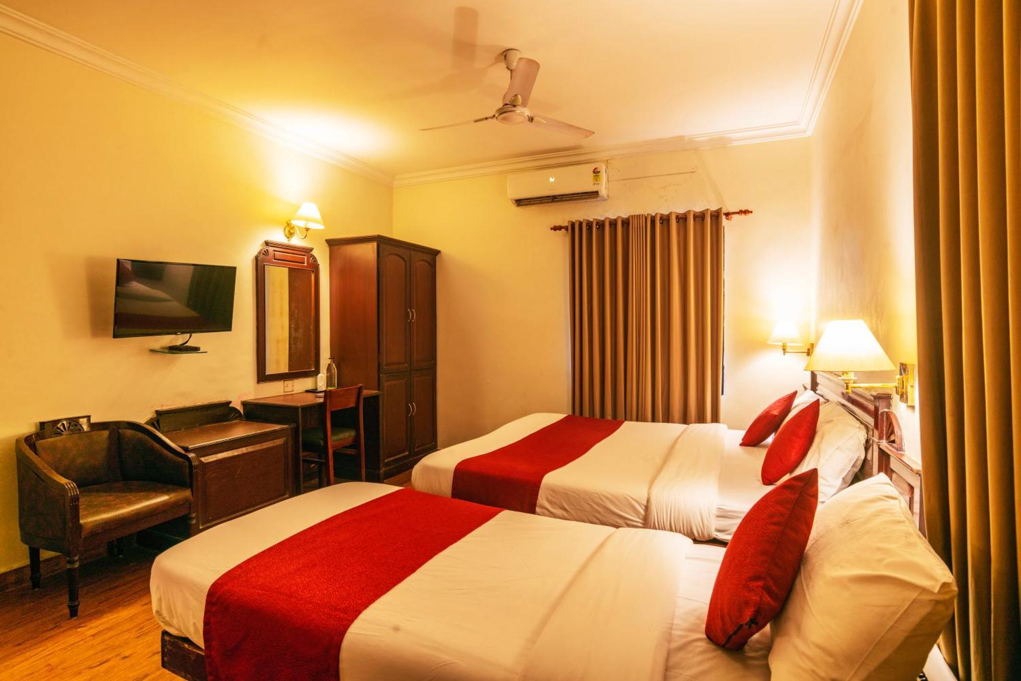 Hotel Archana Inn Kochi Szoba fotó