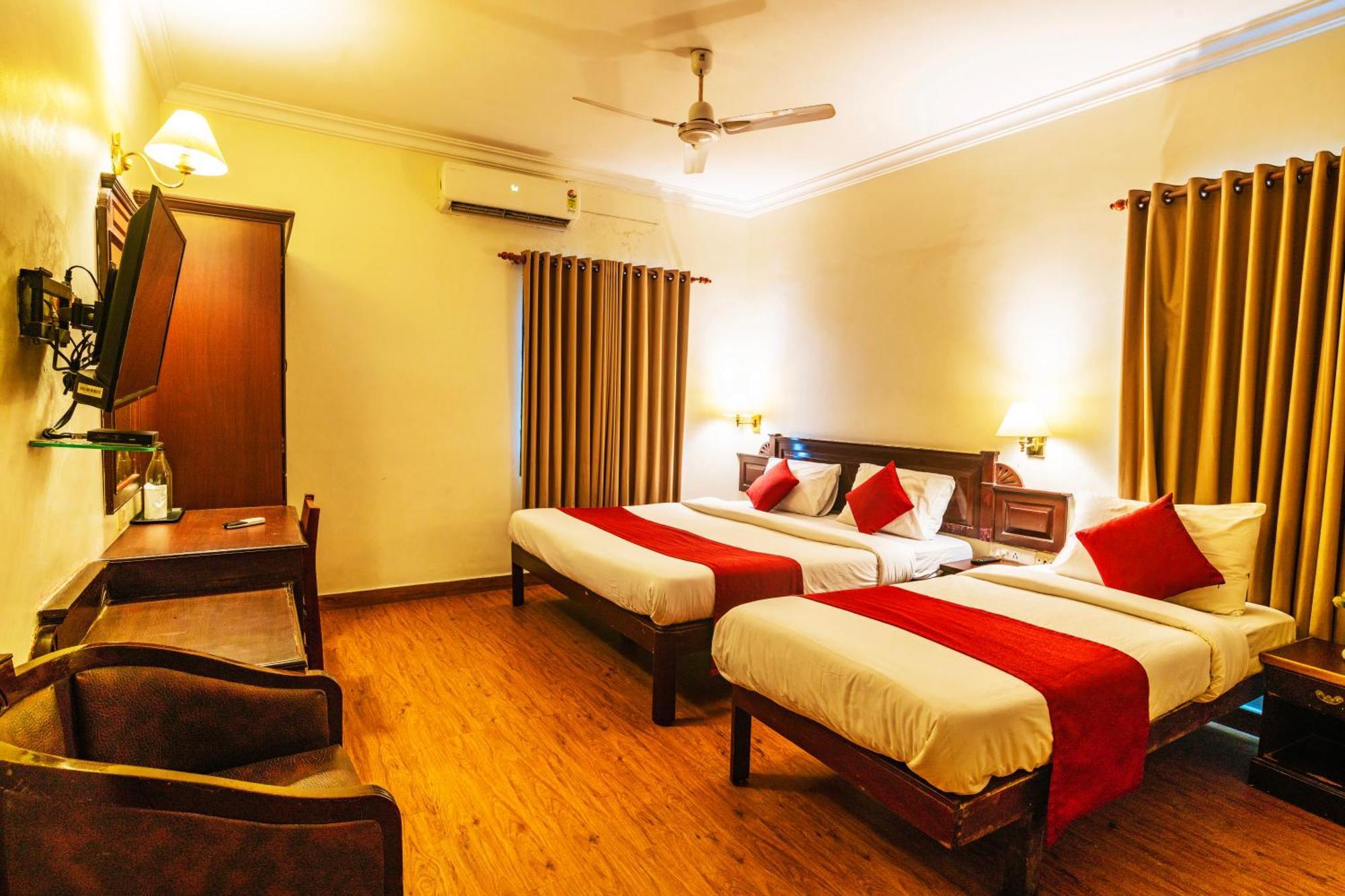 Hotel Archana Inn Kochi Szoba fotó